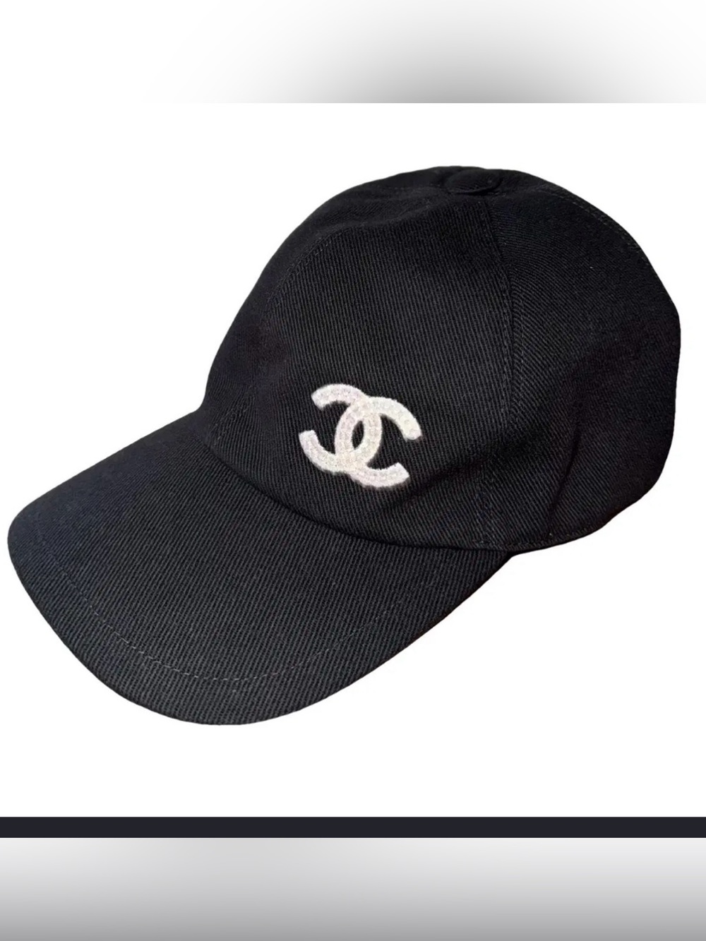 CHANEL Black Cap with White Interlocking CC Emblem
